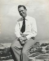 Claude Gillie Younger Sitting on Wall