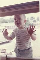 Miles Gillie kid Nose on Window